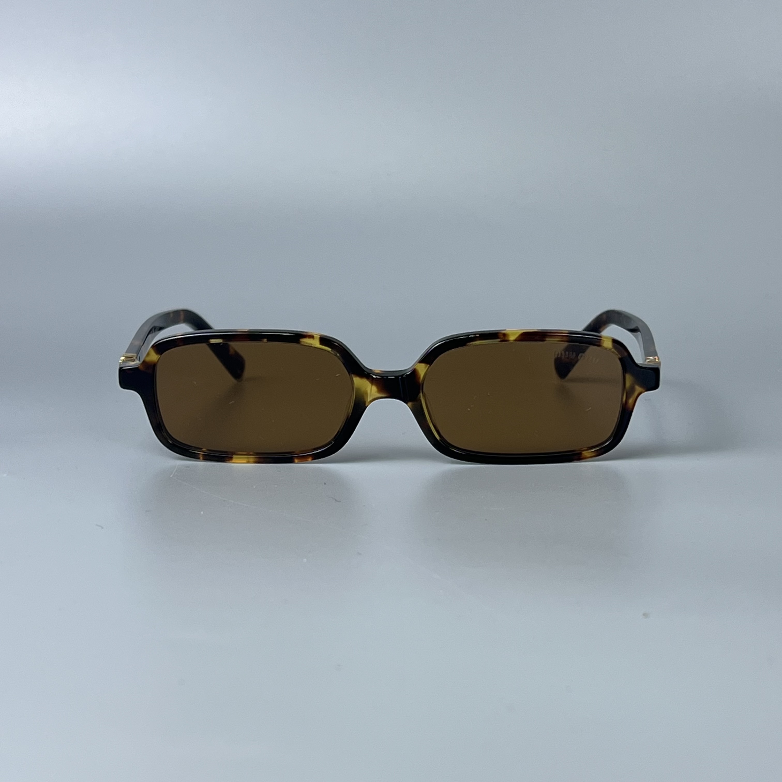 MIU MIU 11ZS VAU2Z1 Honey Havana Sun